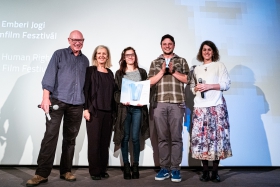The International Jury congratulates Máté Bartha, director of the winner film Downstream /Photo: Balázs Ivándi-Szabó